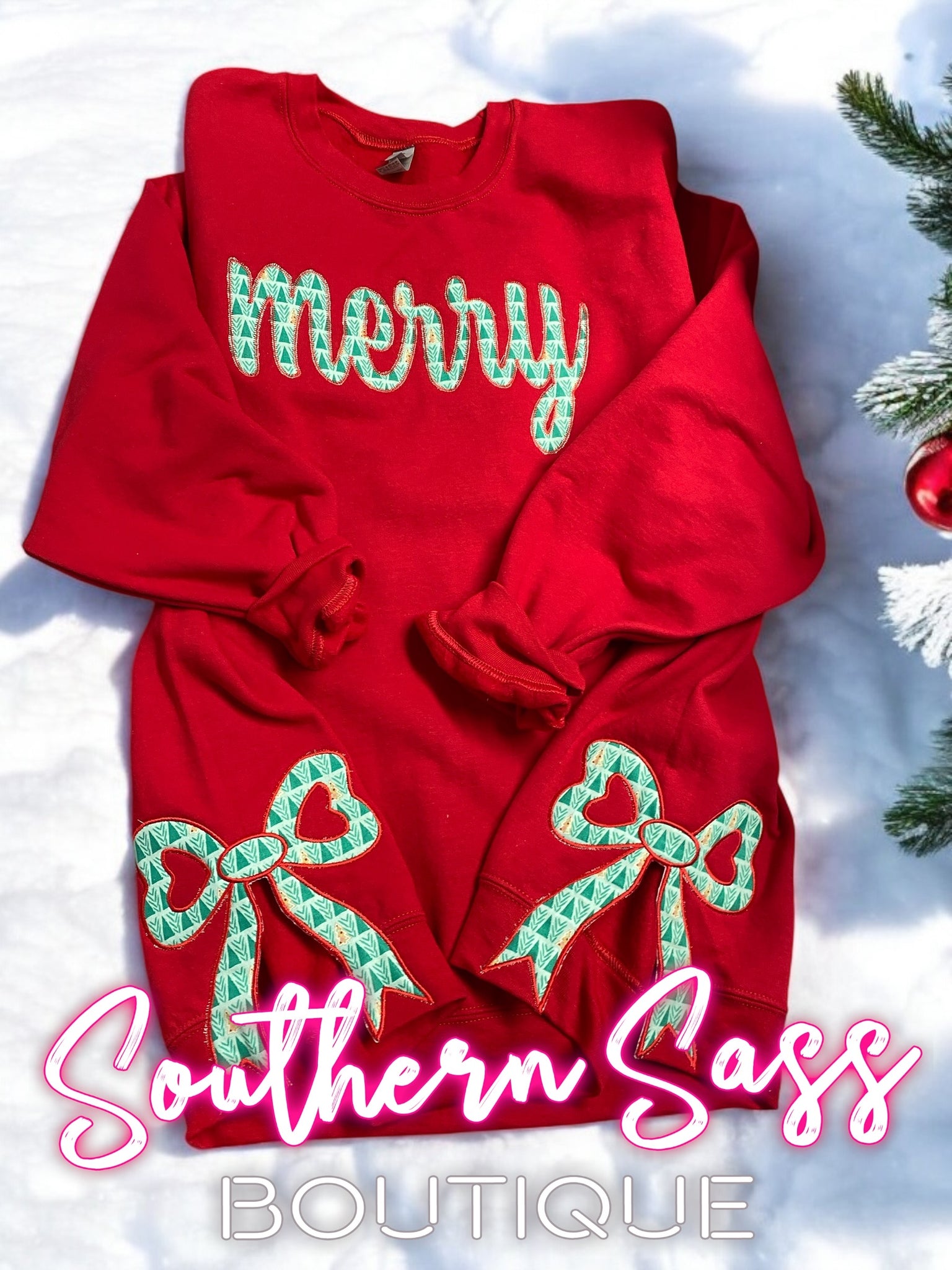 CURSIVE MERRY APPLIQUE ON RED SWEATSHIRT WITH SIDE BOWS