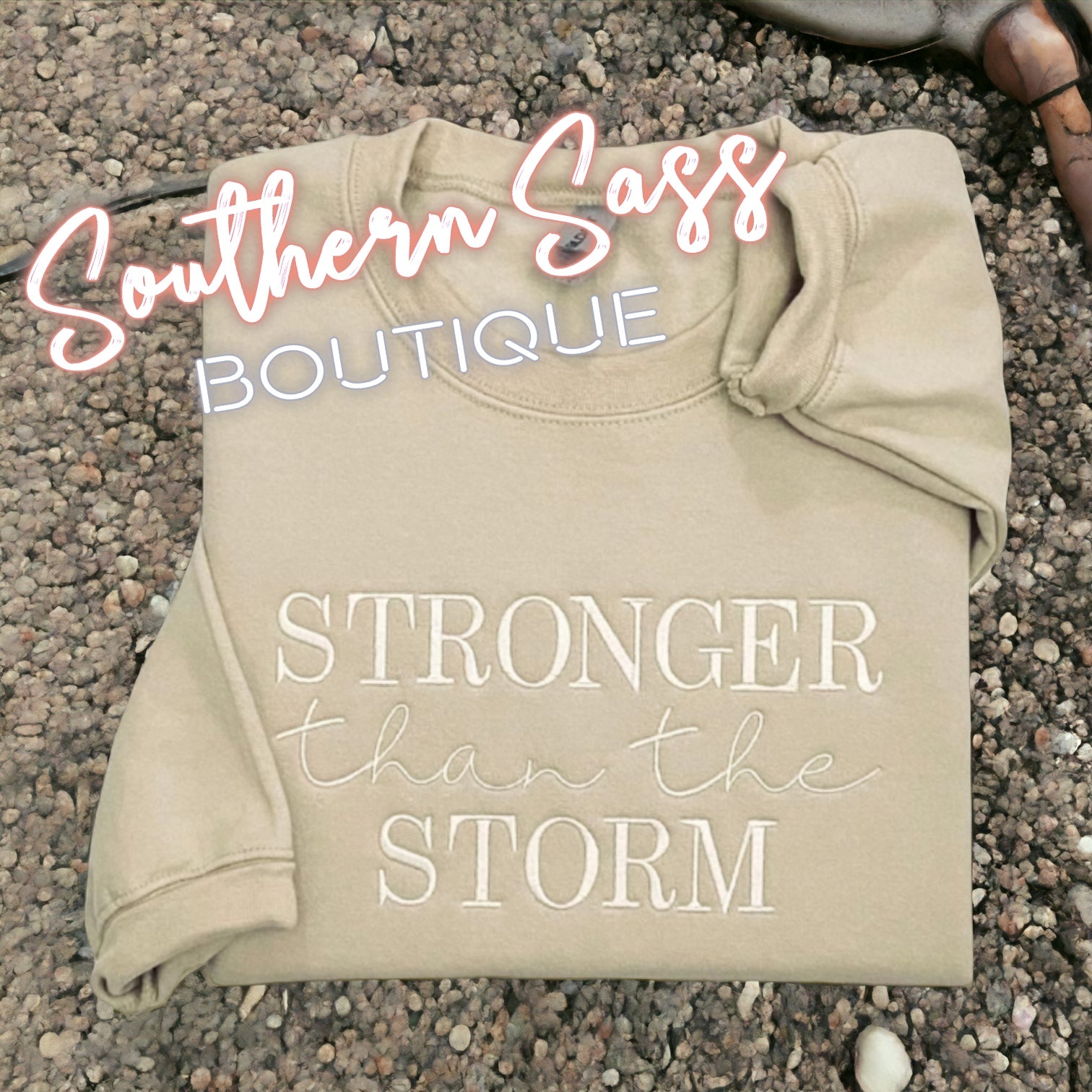 STRONGER THAN THE STORM FULLY EMBROIDERED SWEATSHIRT