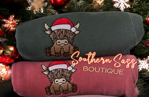 HAPPY HIGHLAND COW WITH SANTA HAT EMBROIDERED SWEATSHIRT