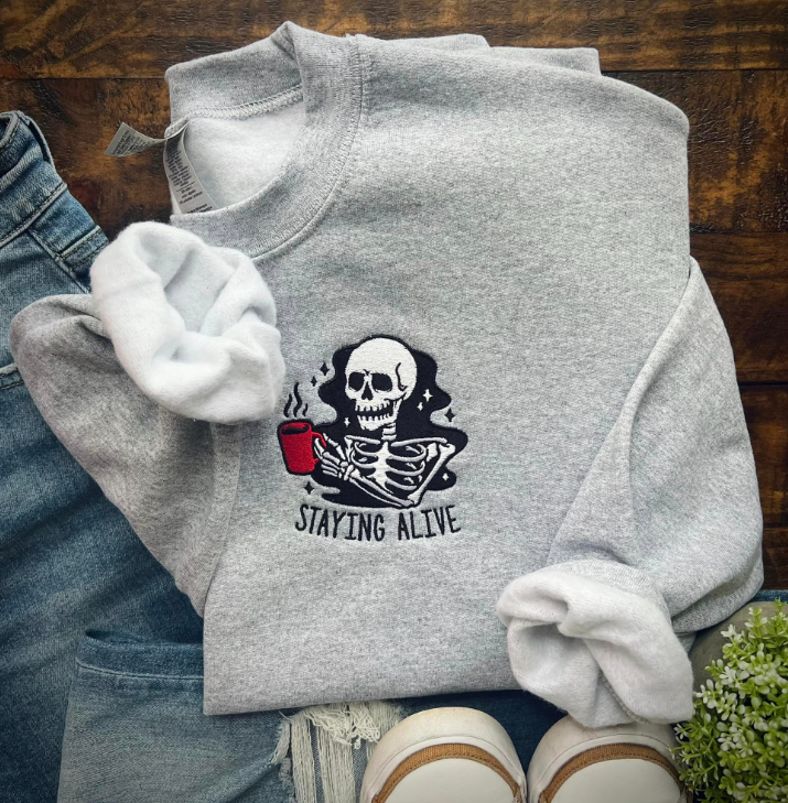 STAYING ALIVE SKELETON EMBROIDERED SWEATSHIRT