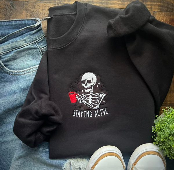 STAYING ALIVE SKELETON EMBROIDERED SWEATSHIRT