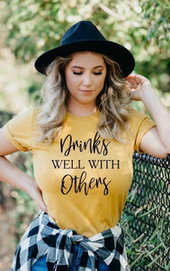 DRINKS WELL WITH OTHERS GRAPHIC TEE